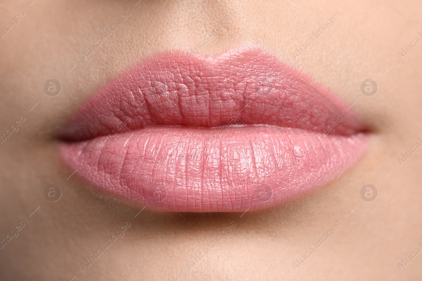 Photo of Closeup view of woman with beautiful full lips