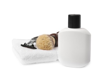 Photo of Lotion, shaving brush, razor and towel on white background