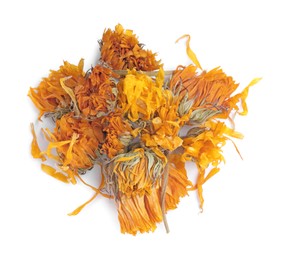 Pile of dry calendula flowers on white background, top view