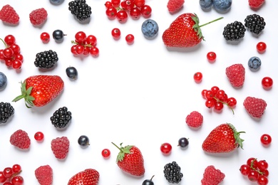 Photo of Frame of different berries on white background, top view