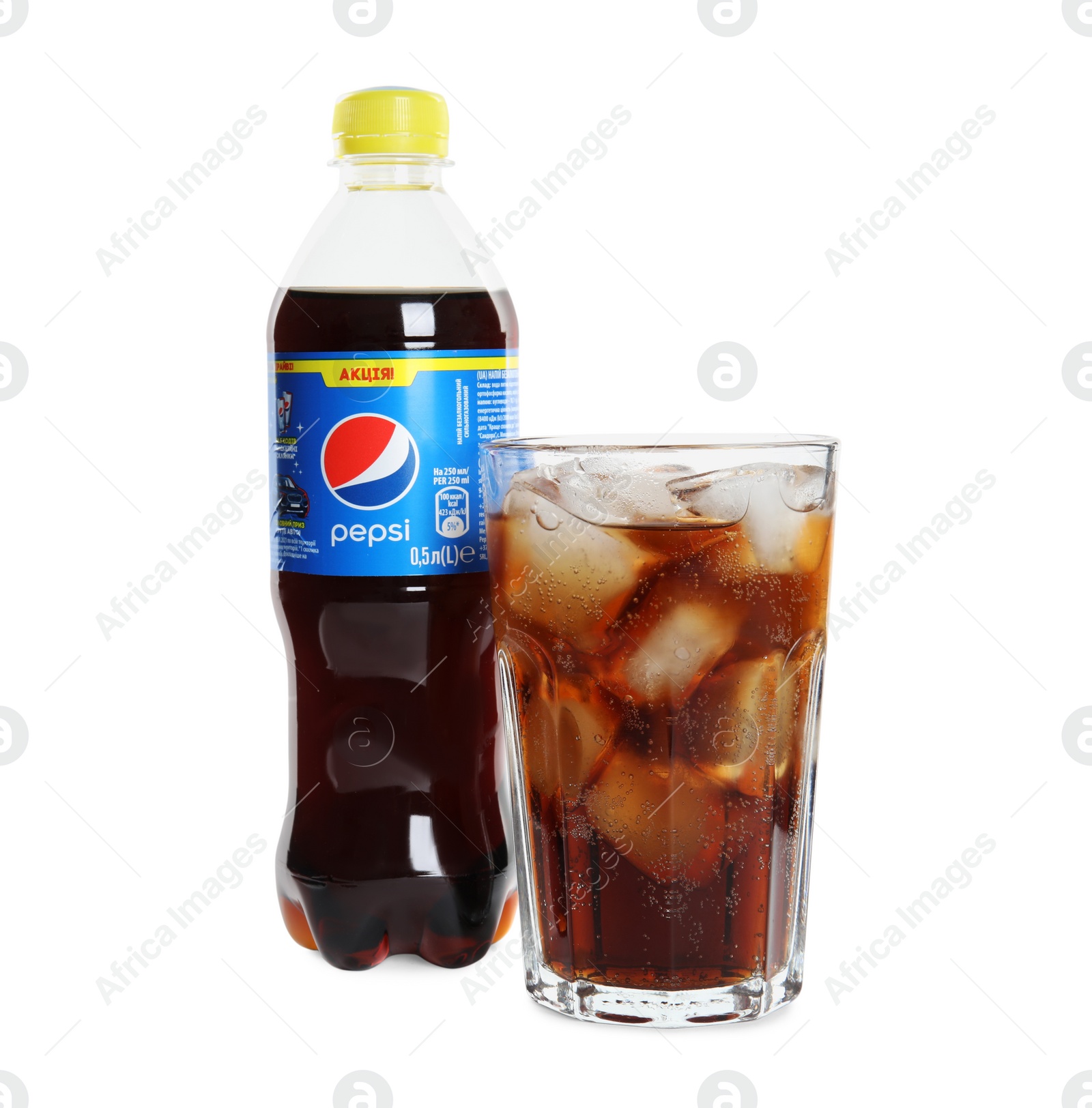 Photo of MYKOLAIV, UKRAINE - FEBRUARY 10, 2021: Glass and bottle of Pepsi on white background