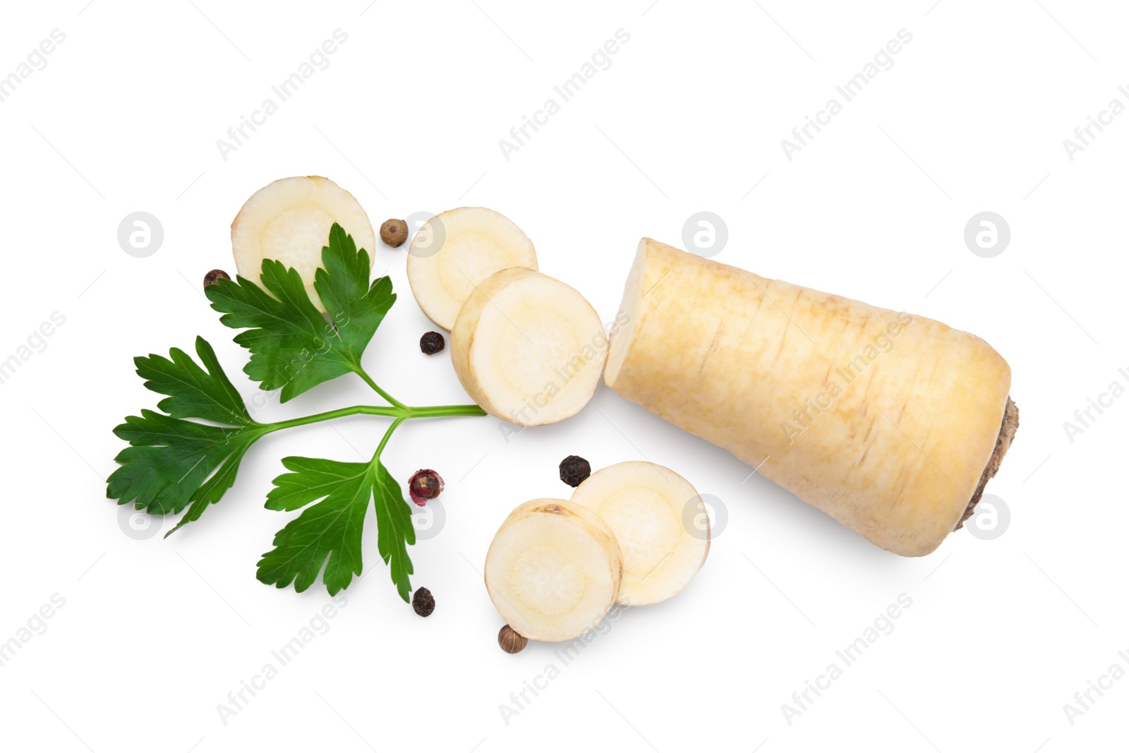 Photo of Whole and cut raw parsley root, fresh herb isolated on white, top view