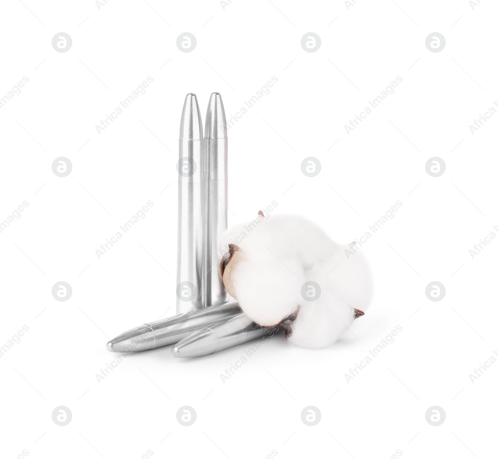 Photo of Bullets and beautiful cotton flower isolated on white
