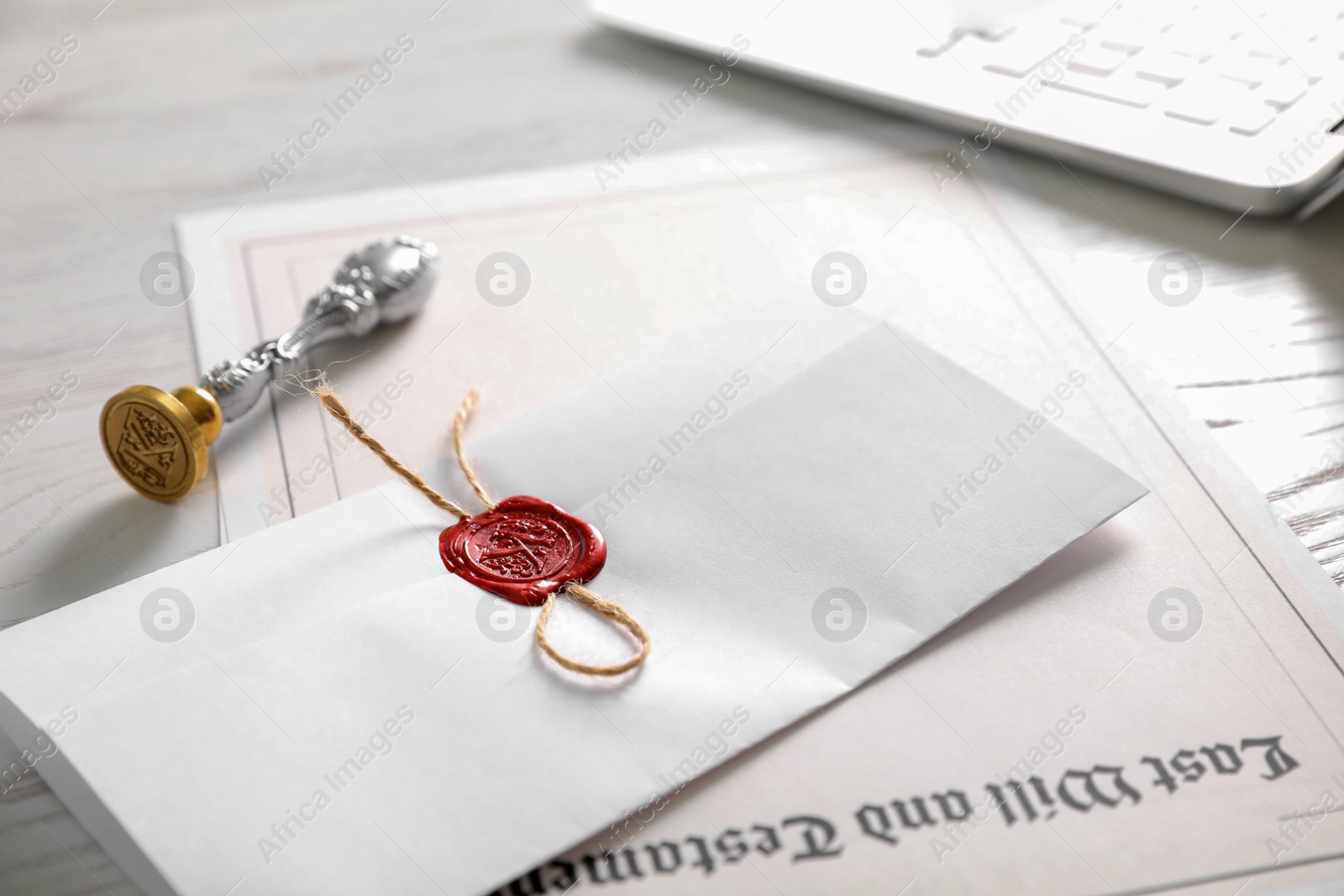 Photo of Vintage notary stamp and documents on desk, closeup