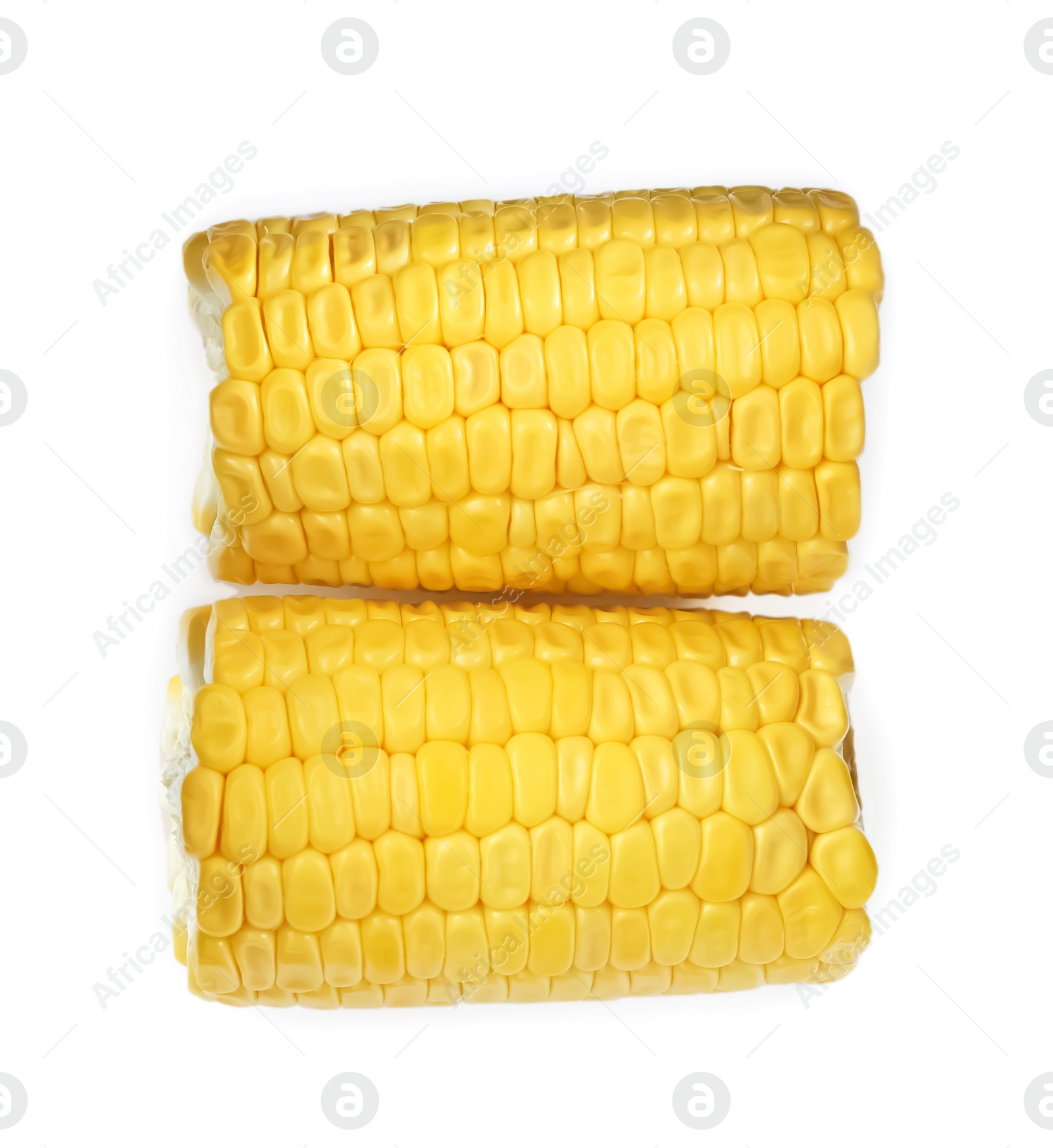 Photo of Pieces of corncobs isolated on white background, top view