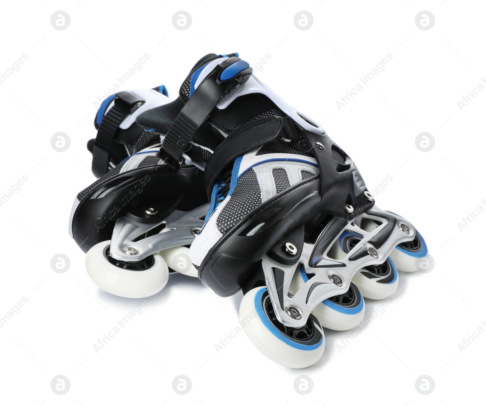 Photo of Pair of inline roller skates on white background