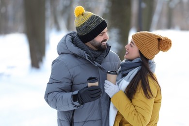 Photo of Beautiful young couple enjoying winter day outdoors