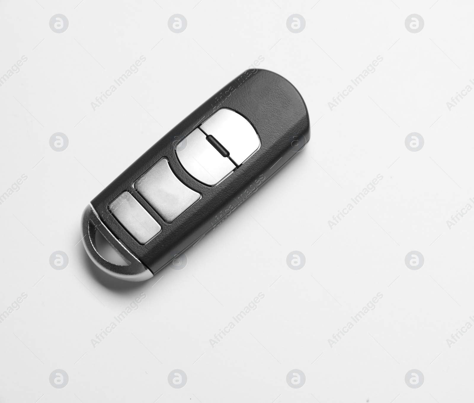 Photo of Modern car smart key on white background