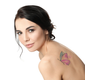 Image of Young woman with colorful tattoobutterfly on her body against white background