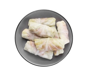 Plate with uncooked stuffed cabbage rolls isolated on white, top view