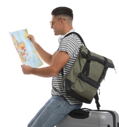 Photo of Man with suitcase and backpack reading map on white background. Summer travel