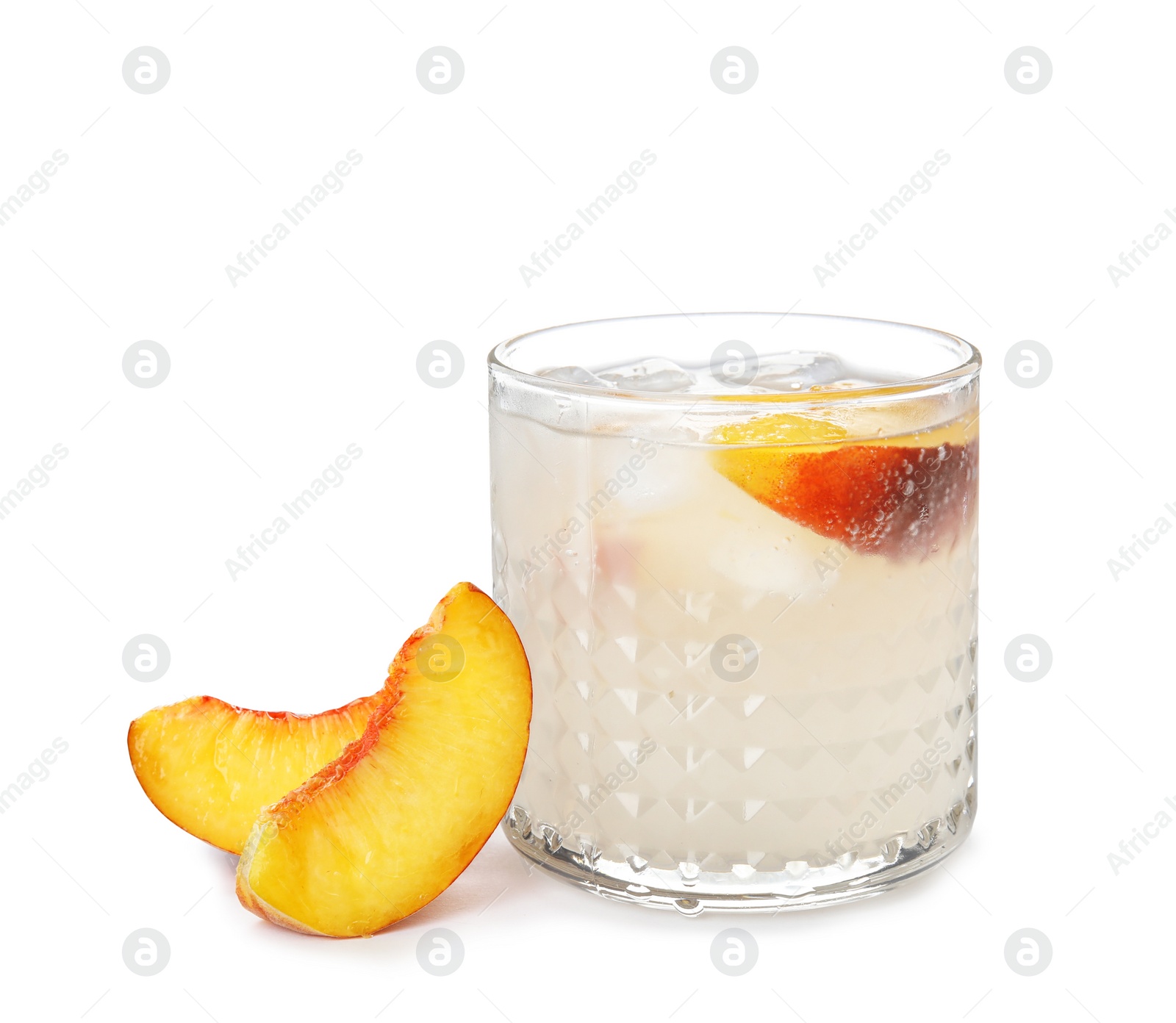 Photo of Peach cocktail in glass and fresh fruit on white background