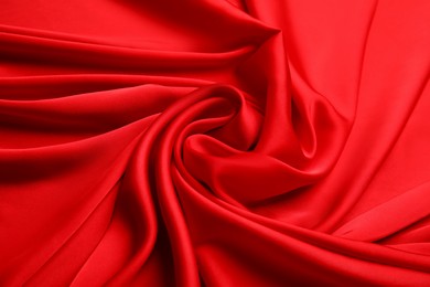Texture of delicate red silk as background, closeup