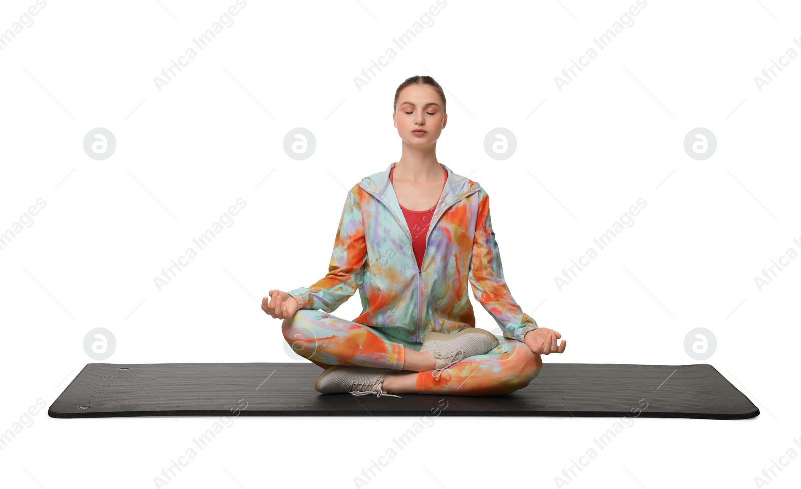 Photo of Young woman practicing yoga on white background