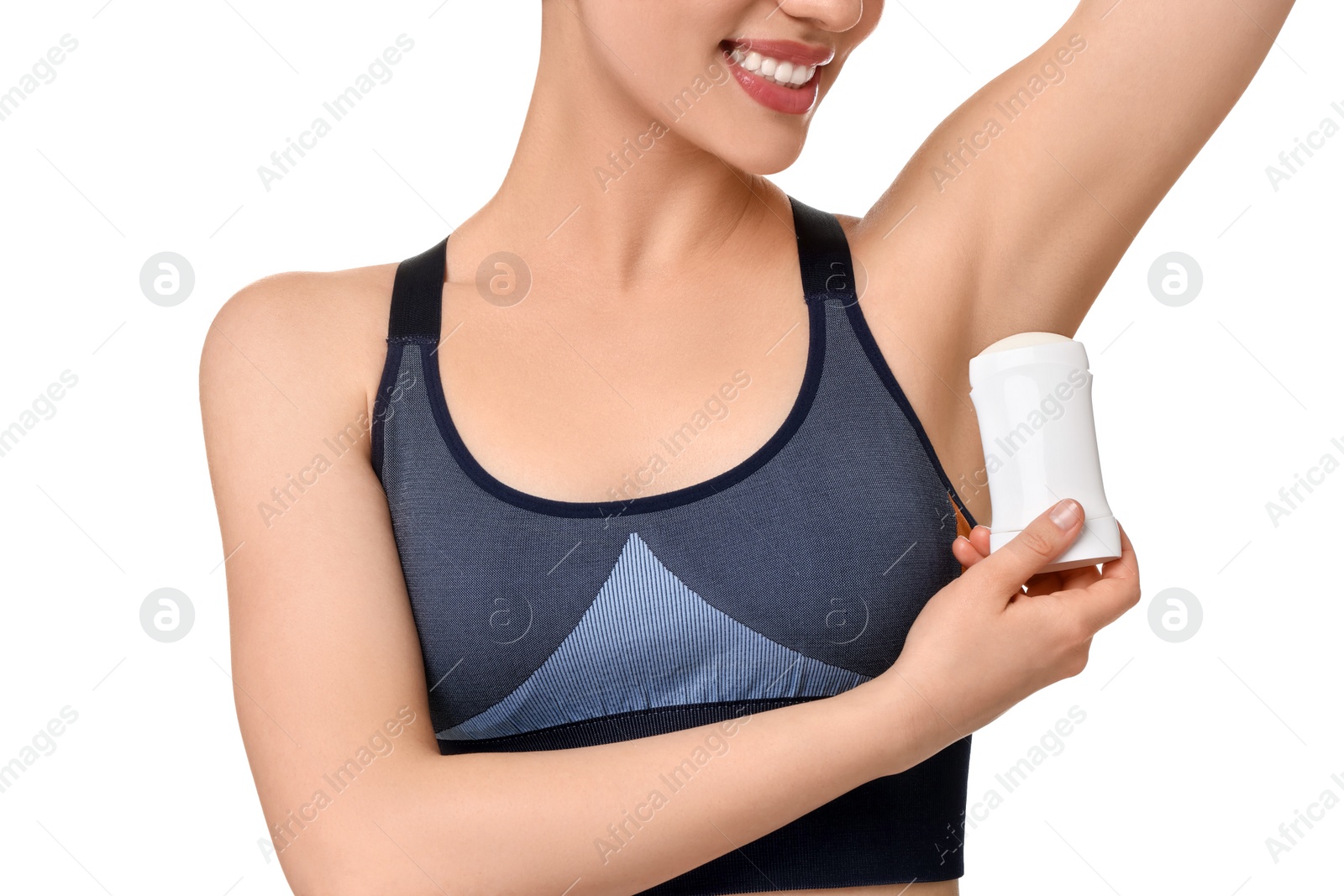 Photo of Woman applying deodorant on white background, closeup