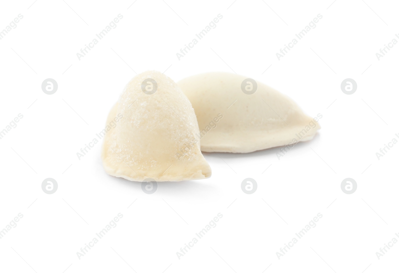 Photo of Raw dumplings with tasty filling on white background