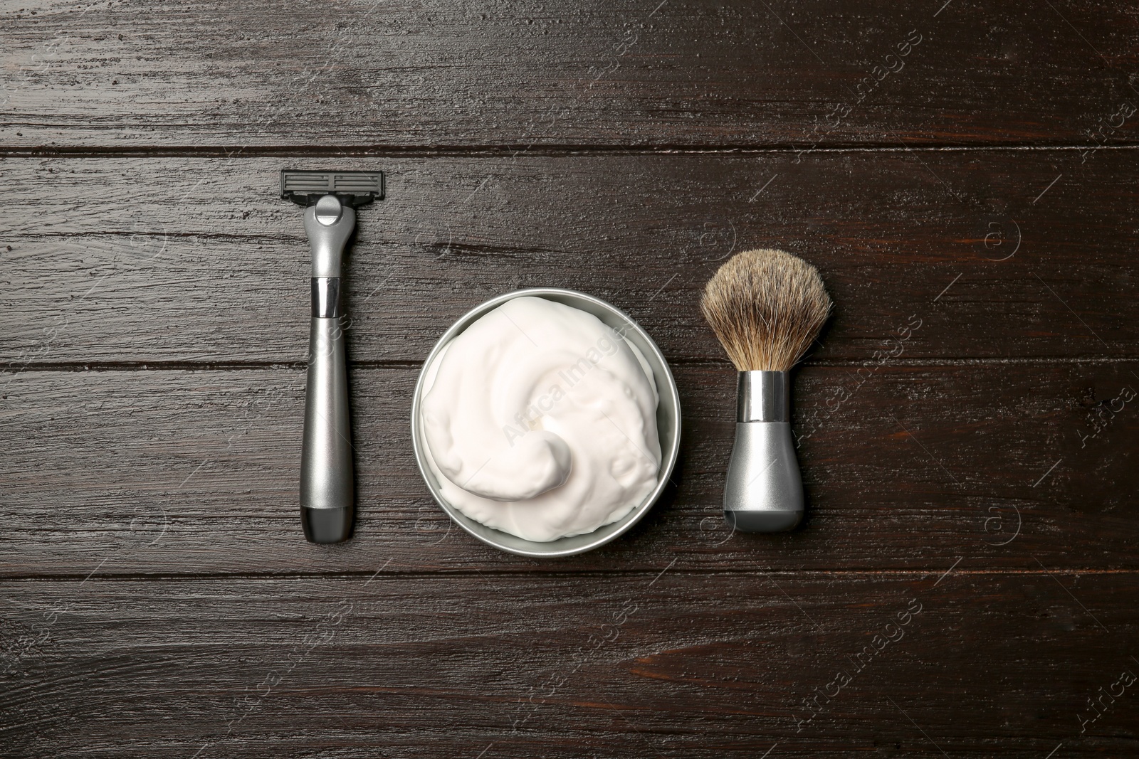 Photo of Flat lay composition with shaving accessories for men on wooden background