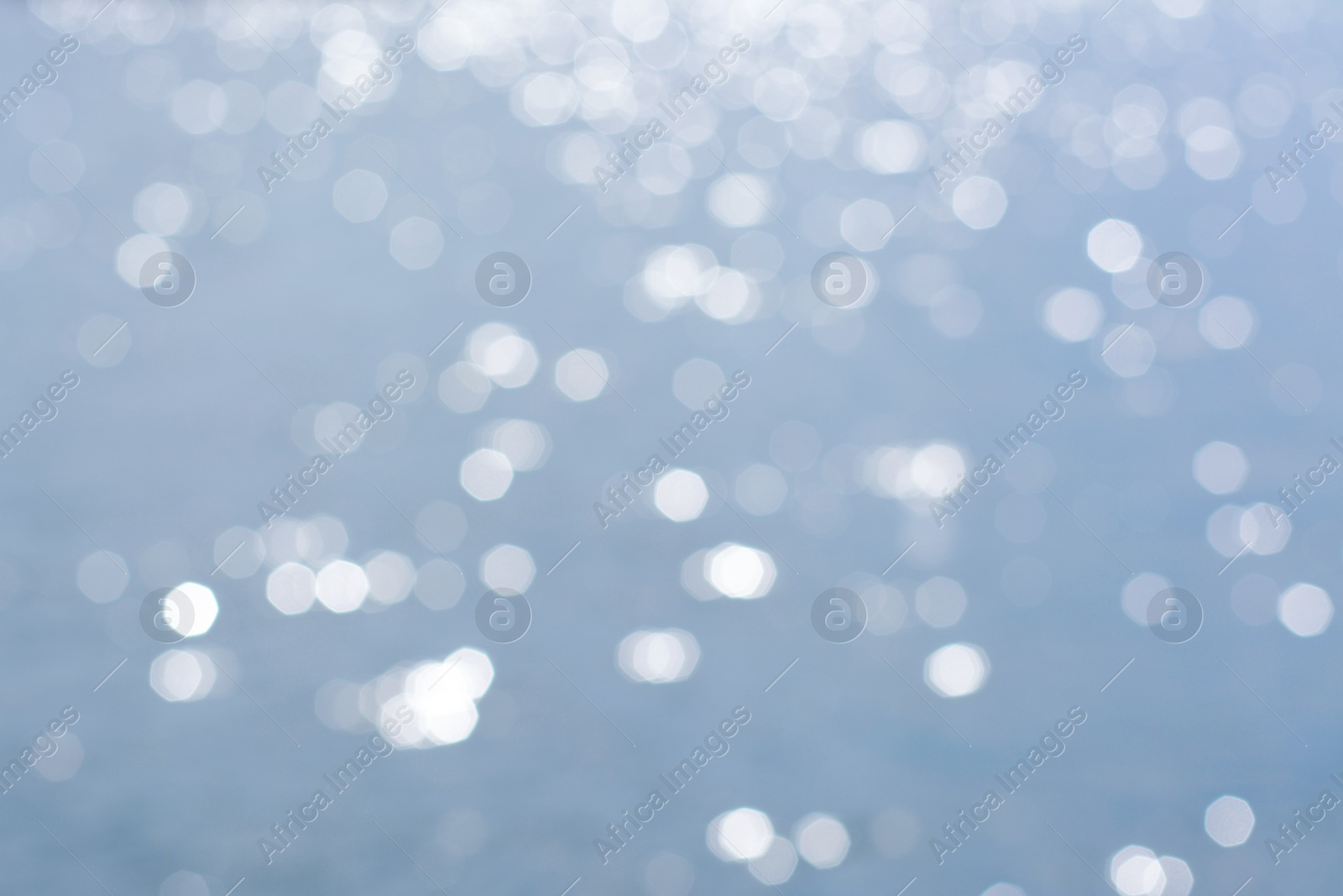 Photo of Blurred view of seascape on sunny day, bokeh effect