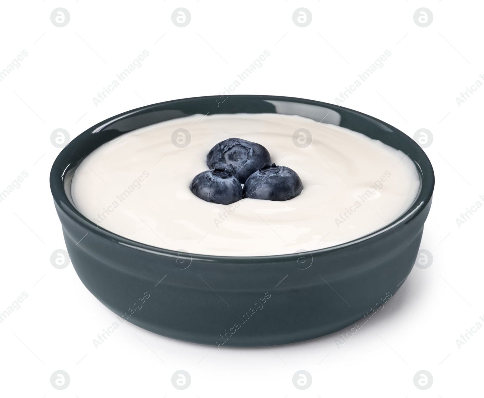 Photo of Bowl of delicious yogurt with blueberries isolated on white