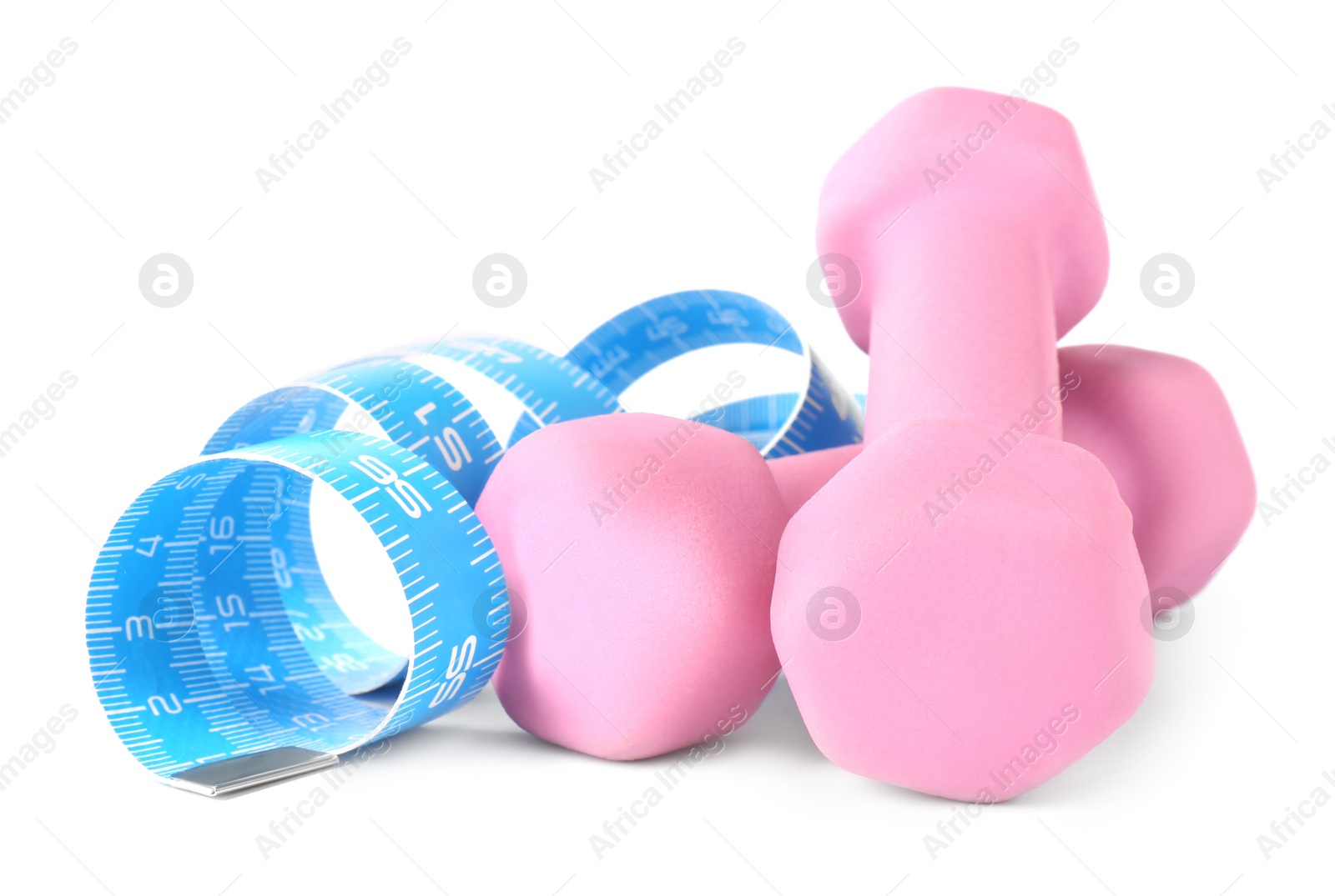 Photo of Dumbbells and measuring tape isolated on white