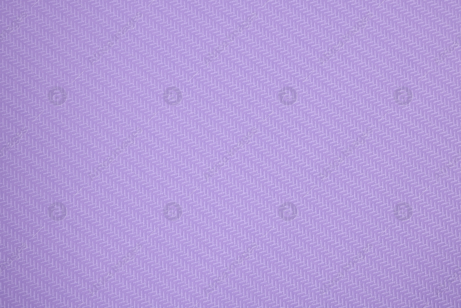 Photo of Stylish violet wallpaper as background, closeup view