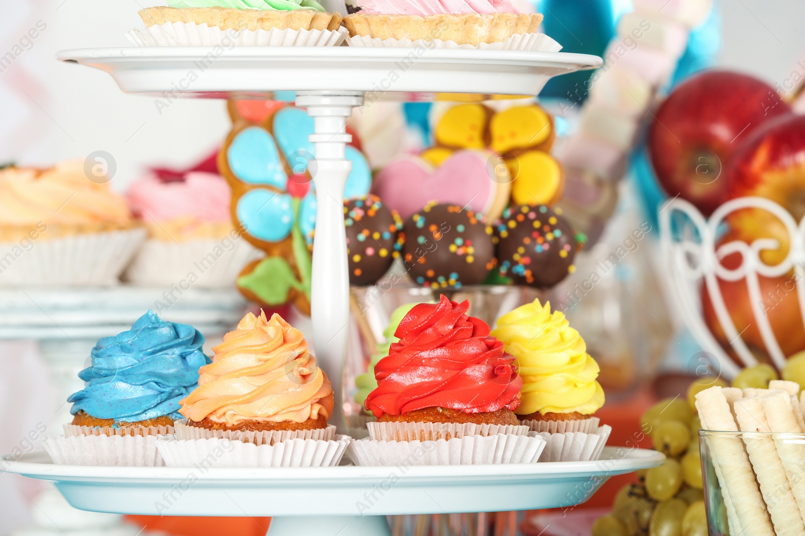 Photo of Candy bar with delicious treats for birthday party, closeup