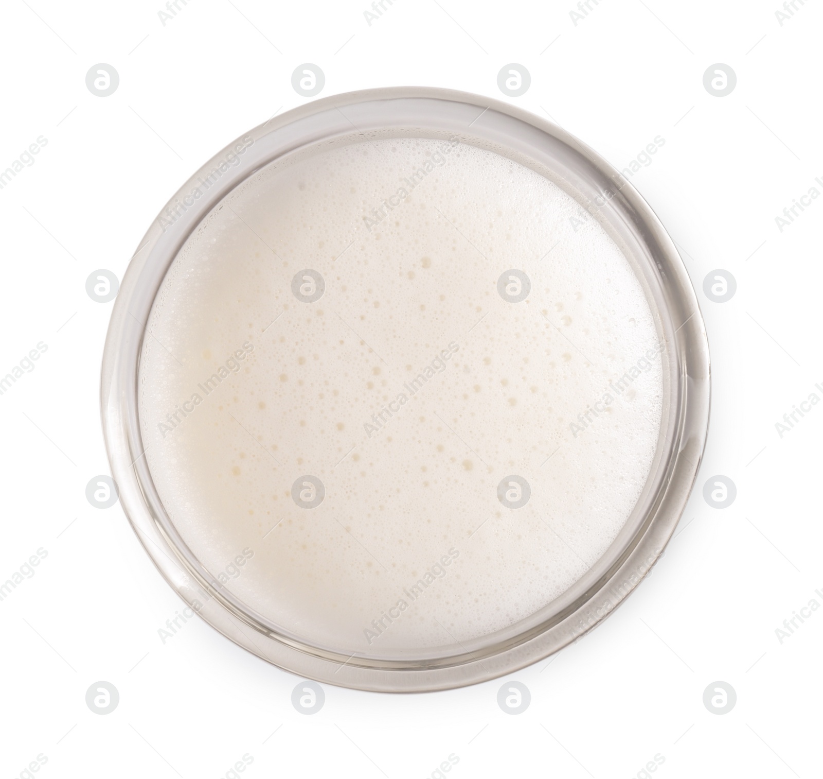 Photo of Glass of fresh milk isolated on white, top view