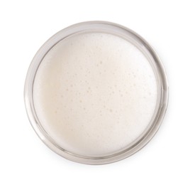 Photo of Glass of fresh milk isolated on white, top view