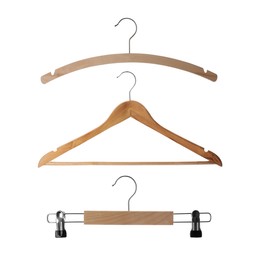 Image of Set with different empty hangers on white background