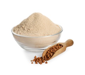 Photo of Bowl with flour and scoop of buckwheat on white background