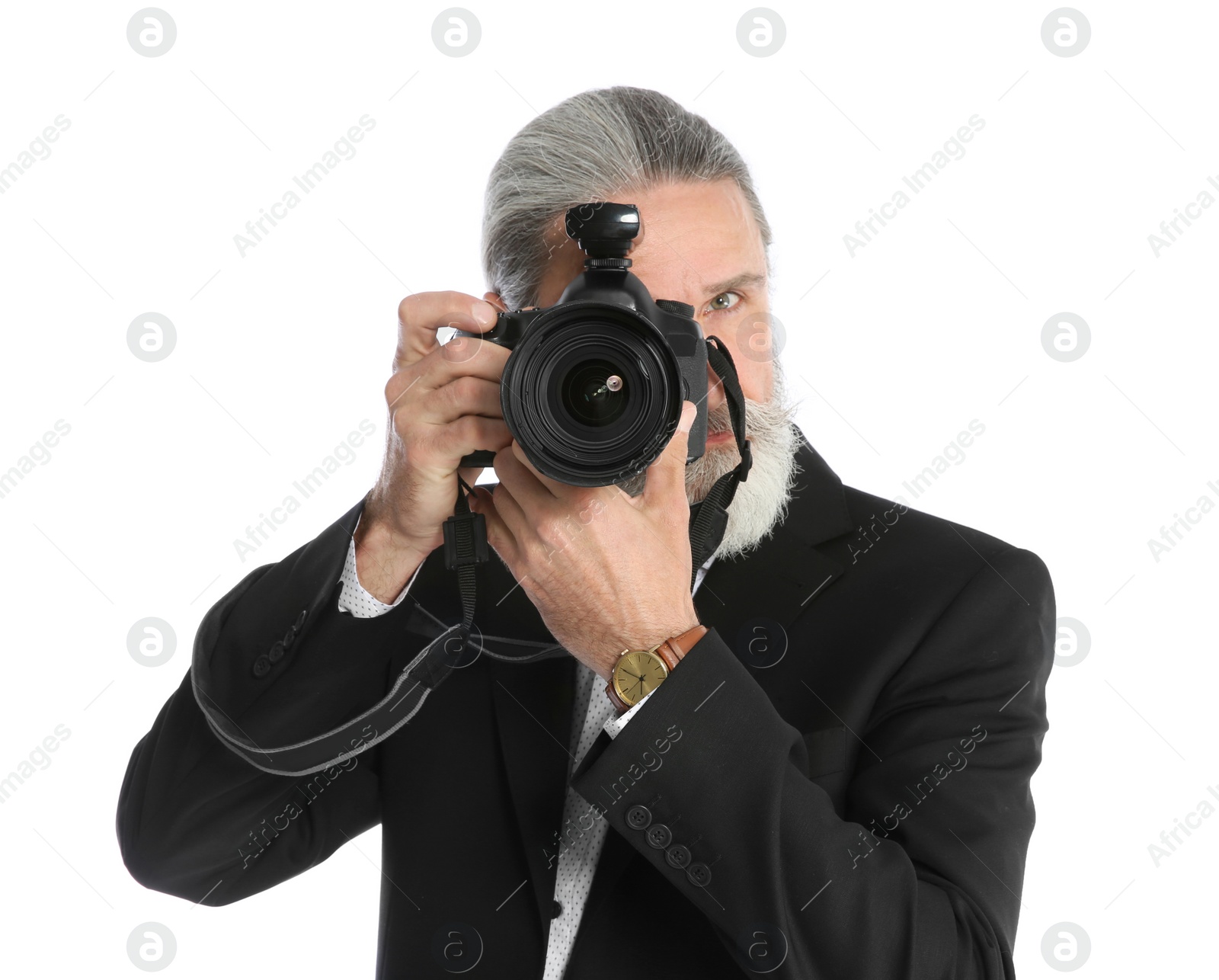 Photo of Male photographer with professional camera on white background