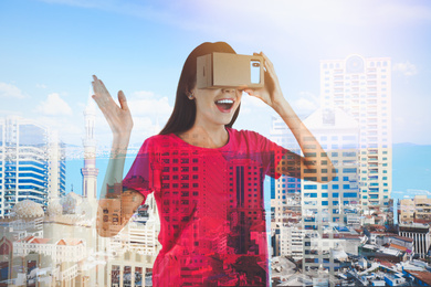 Image of Double exposure of woman using virtual reality headset and cityscape. Modern technology