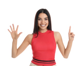 Photo of Woman showing number six with her hands on white background