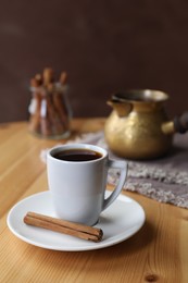 Turkish coffee. Freshly brewed beverage on wooden table