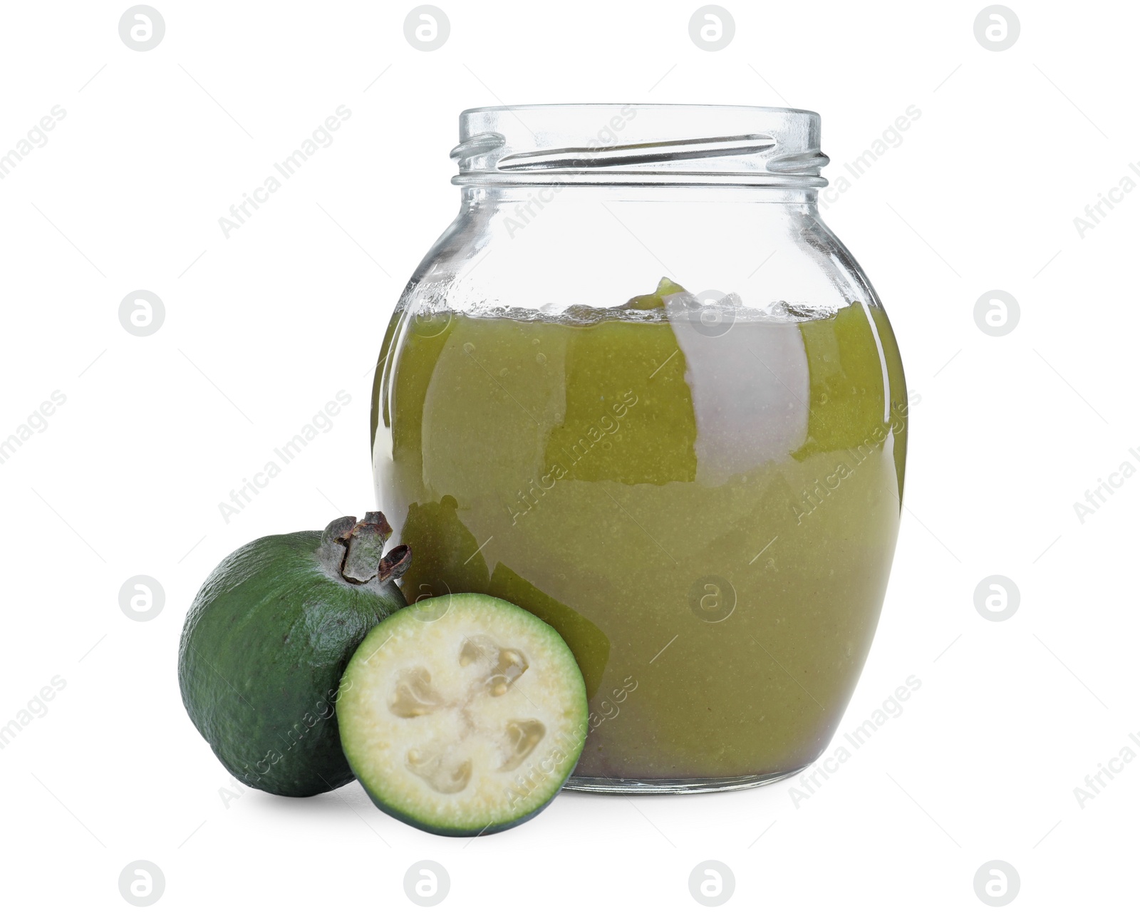 Photo of Feijoa jam in glass jar and fresh fruits on white background