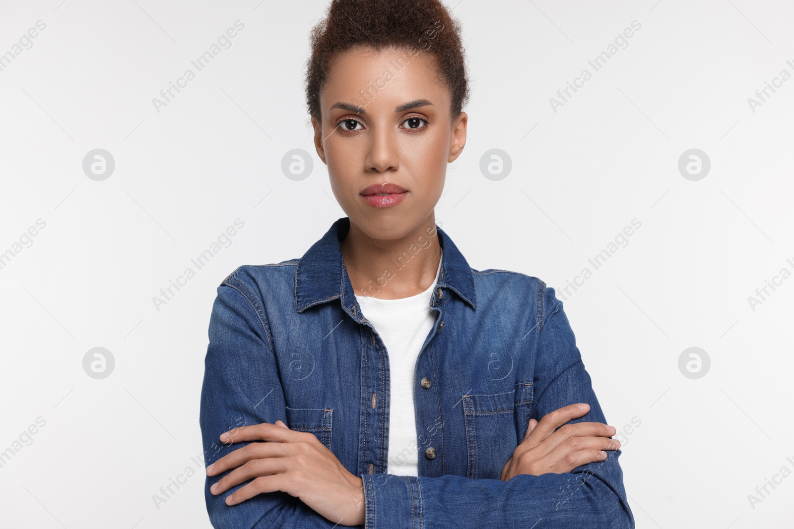 Photo of Portrait of beautiful young woman on white background