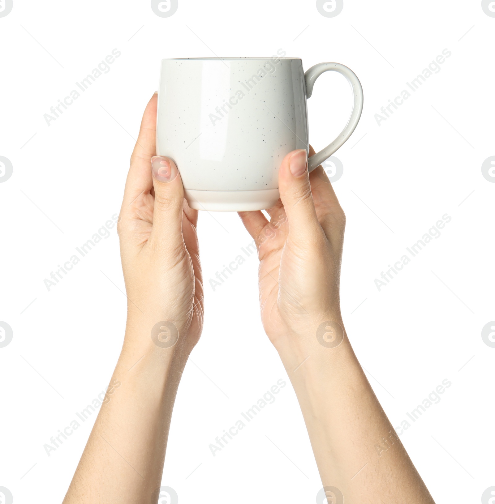 Photo of Woman holding ceramic cup on white background, closeup