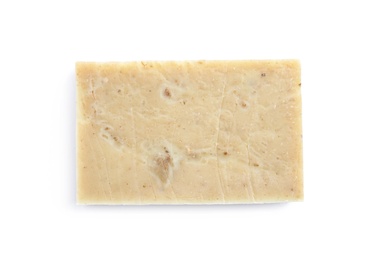 Hand made soap bar on white background, top view