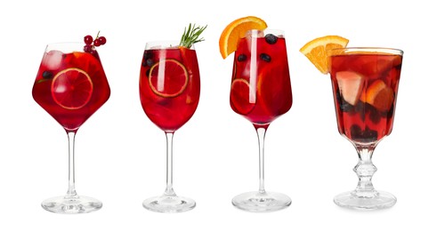 Set with glasses of Red Sangria cocktail on white background