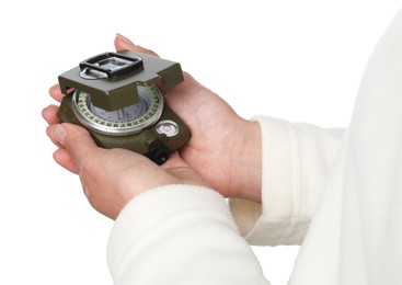 Photo of Woman holding compass on white background, closeup