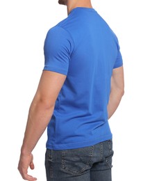 Photo of Man wearing blue t-shirt on white background, closeup. Mockup for design