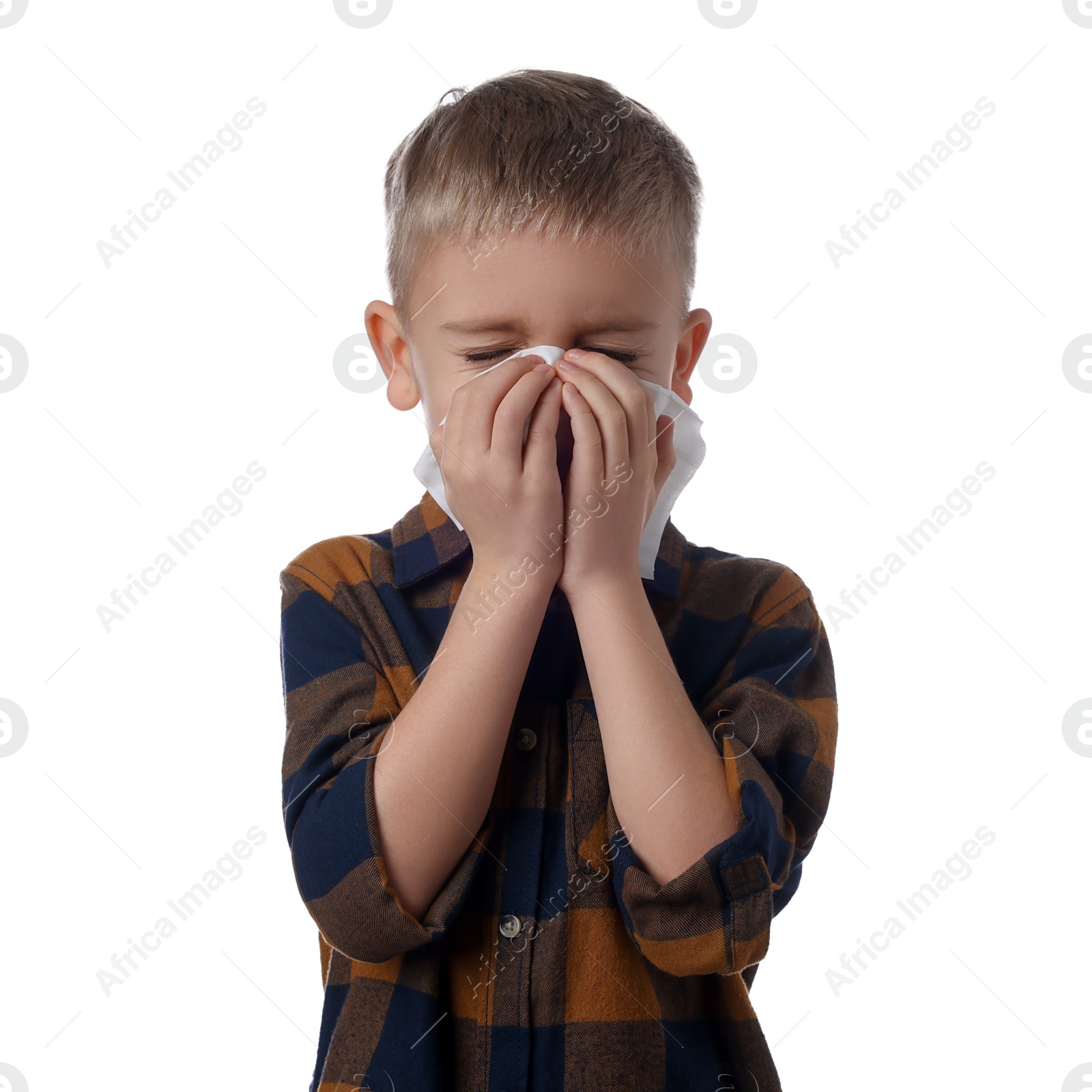 Photo of Sick boy with tissue coughing on white background. Cold symptoms