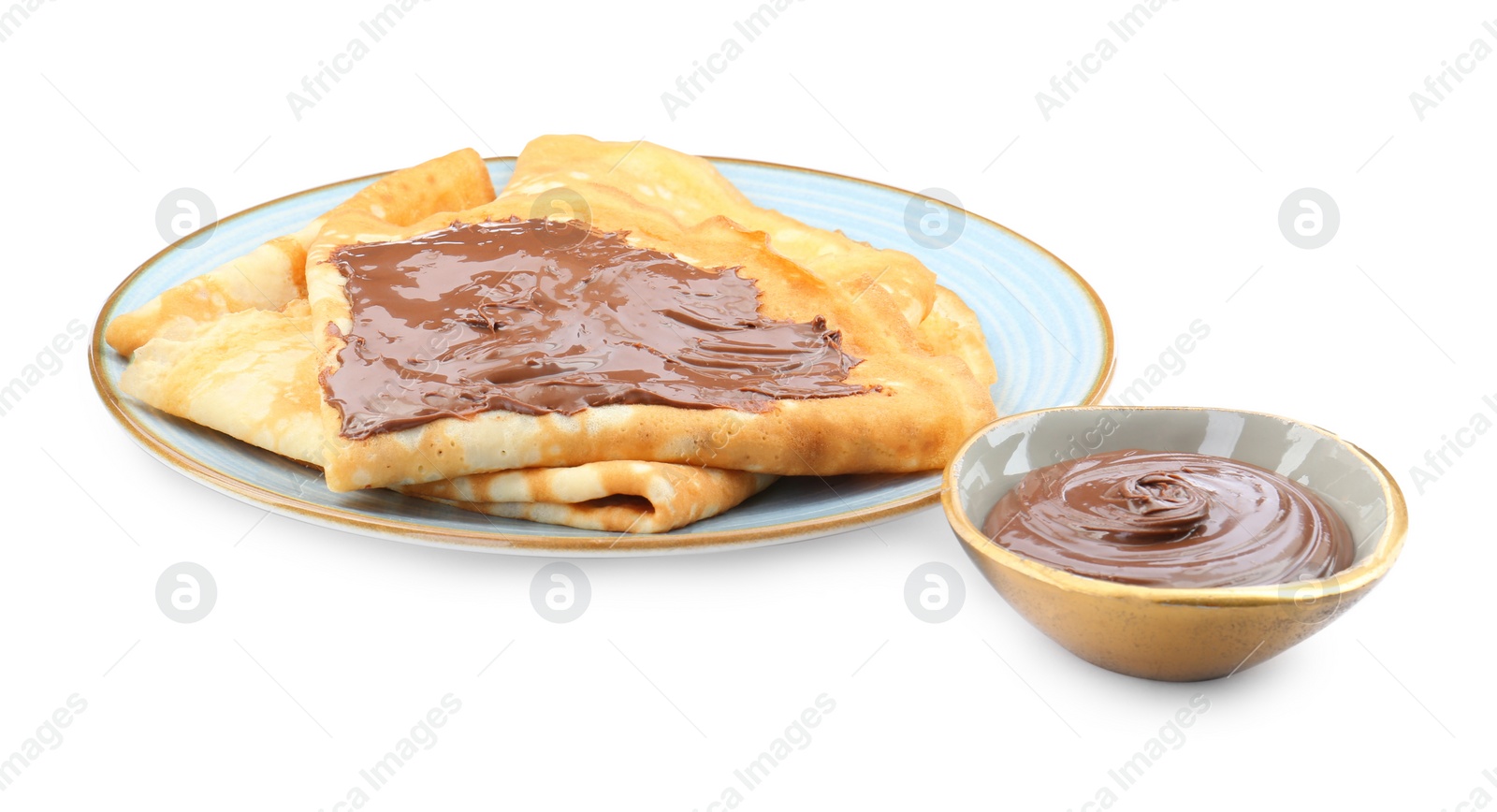 Photo of Tasty crepes with chocolate paste isolated on white