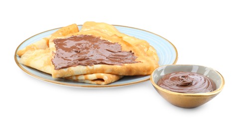 Photo of Tasty crepes with chocolate paste isolated on white