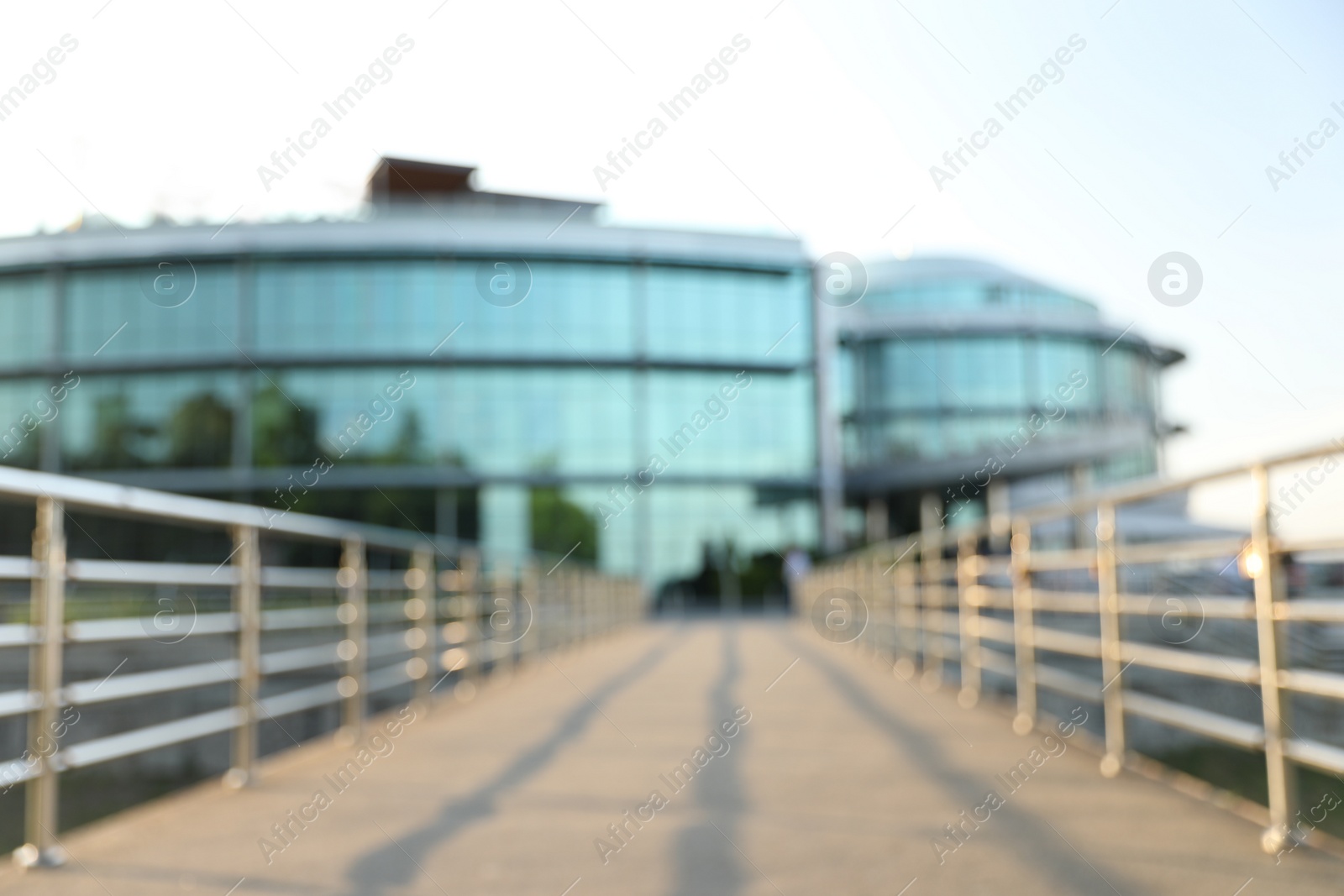 Photo of Blurred view of modern buildings with windows. Urban architecture