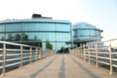 Blurred view of modern buildings with windows. Urban architecture