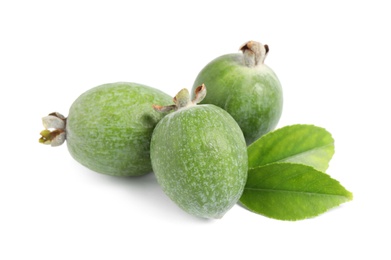 Photo of Delicious feijoas and leaves on white background