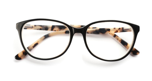 Photo of Glasses with corrective lenses on white background. Vision problem