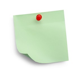 Photo of Blank light green note pinned on white background, top view