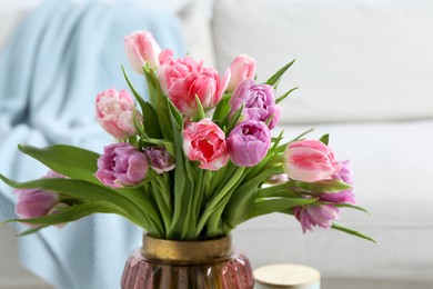 Photo of Beautiful bouquet of colorful tulip flowers indoors, closeup